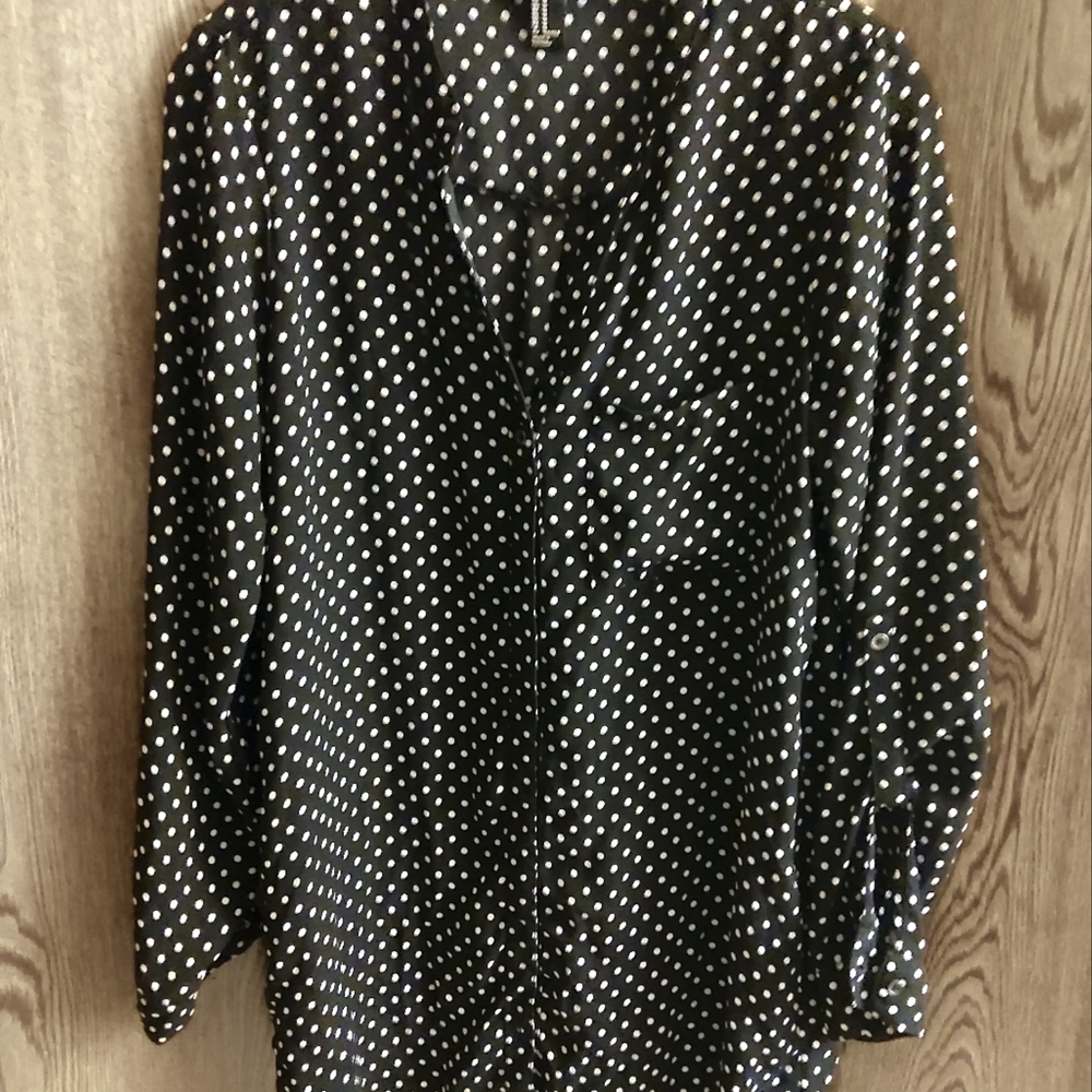 A very Beautiful black polka dot Forever21 business like (blouse) for the office